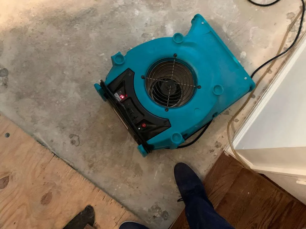 Air mover drying subfloor during Leak Detection & Repair in Pittsburgh